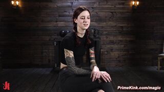 Redhead bound in a bridge position whipped