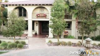 Swinger babes playing naked in the water