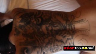 Softcore doggystyle for a tattooed Asian