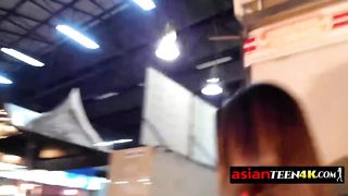 Kinky Asian cutie is sucking a huge cock