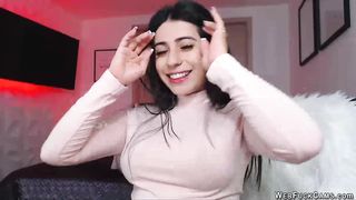 Busty clothed camgirl sucks vibrator