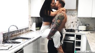 Busty brunette gets anal in the kitchen