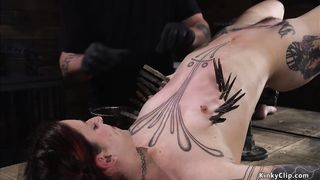 Tattooed brunette slave is vibrated