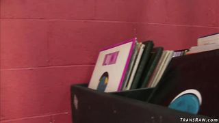 Shemale fucks busty redhead in her shop