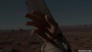 Predators whip bound slut in desert