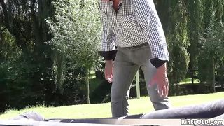 Grandpa gave lotion to a sunbathing teen