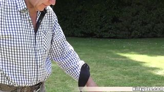 Grandpa gave lotion to a sunbathing teen