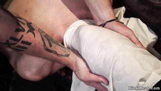 Brunette in one leg inverted suspension