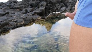 My girlfriend plays with my dick while I pee