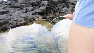 My girlfriend plays with my dick while I pee