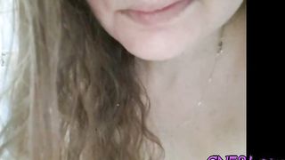 Having fun with a cucumber in the shower