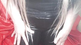 Susi is wearing black latex