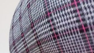 Hot babe in shiny tights on the bed