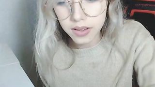 Busty Blonde Chick with glasses playing around