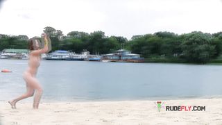 Nude beach girl is having a great time