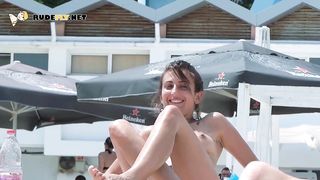 Cute nudist teen loves being topless on the beach
