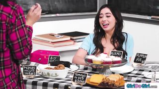 Stepmom licking stepdaughter under table