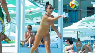 Volleyball with beautiful nudists
