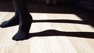 Passionate MILF in black pantyhose rubs her wet pussy and gets orgasm close